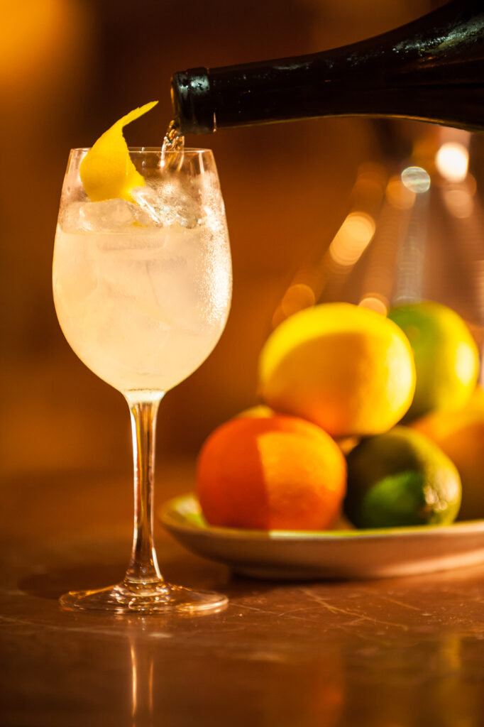 Lemon cocktail pouring